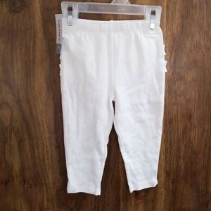 Carter's white/ ivory leggings, size 9 months